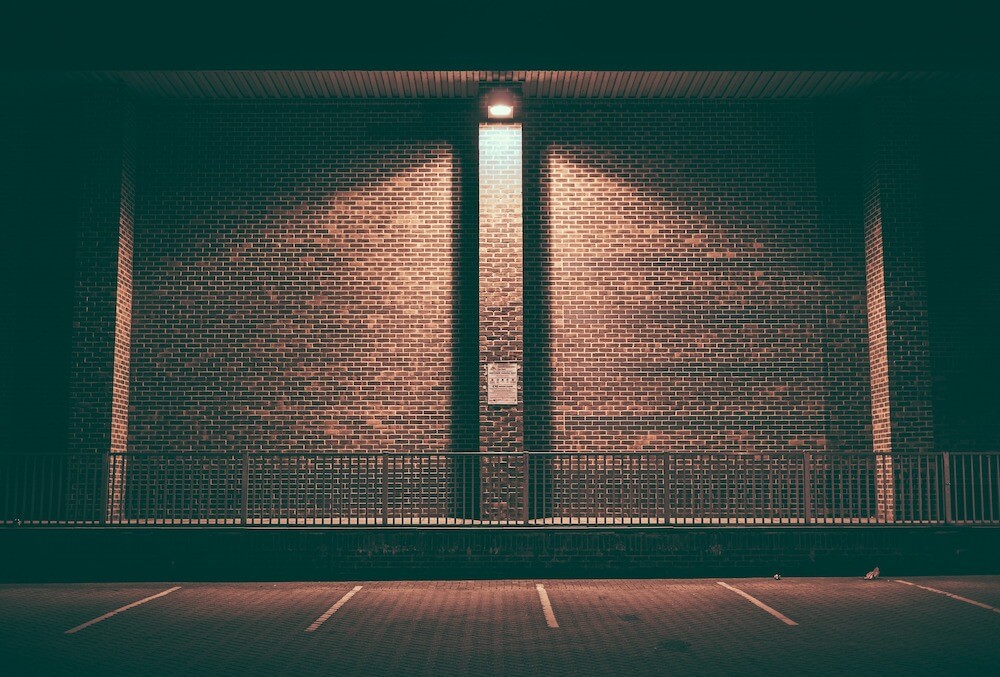 dim light over parking spaces